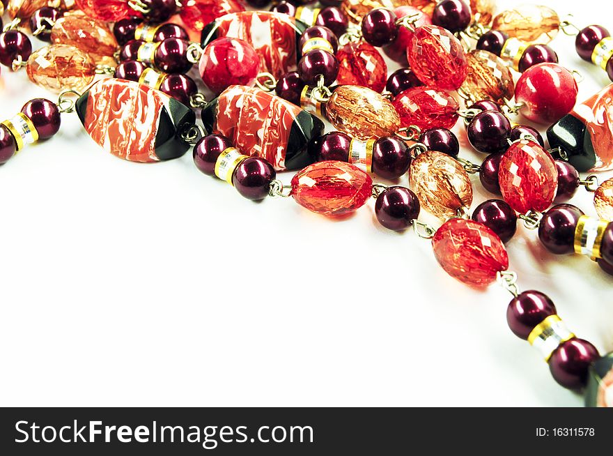 Red necklace on a white background