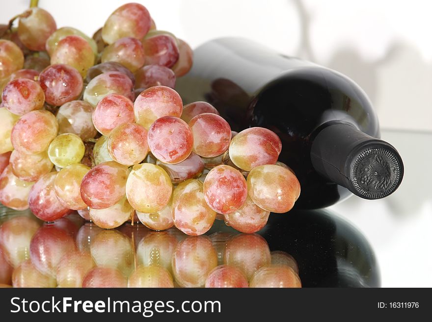 Fresh purple grape fruit on white background