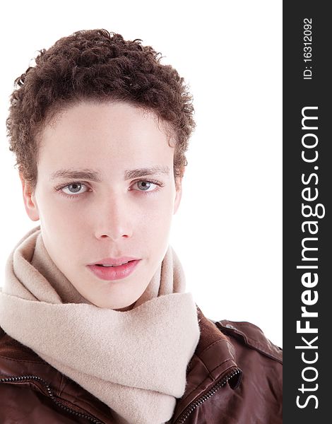 Portrait of a serious young man, with winter clothes, on white background. Studio shot