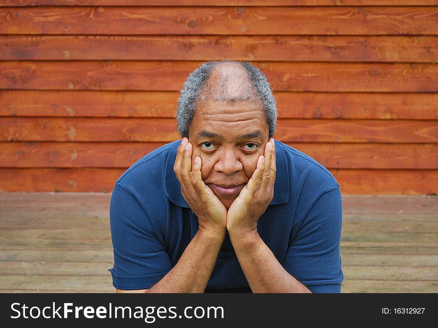 Expressions of an african american man outdoors. Expressions of an african american man outdoors.