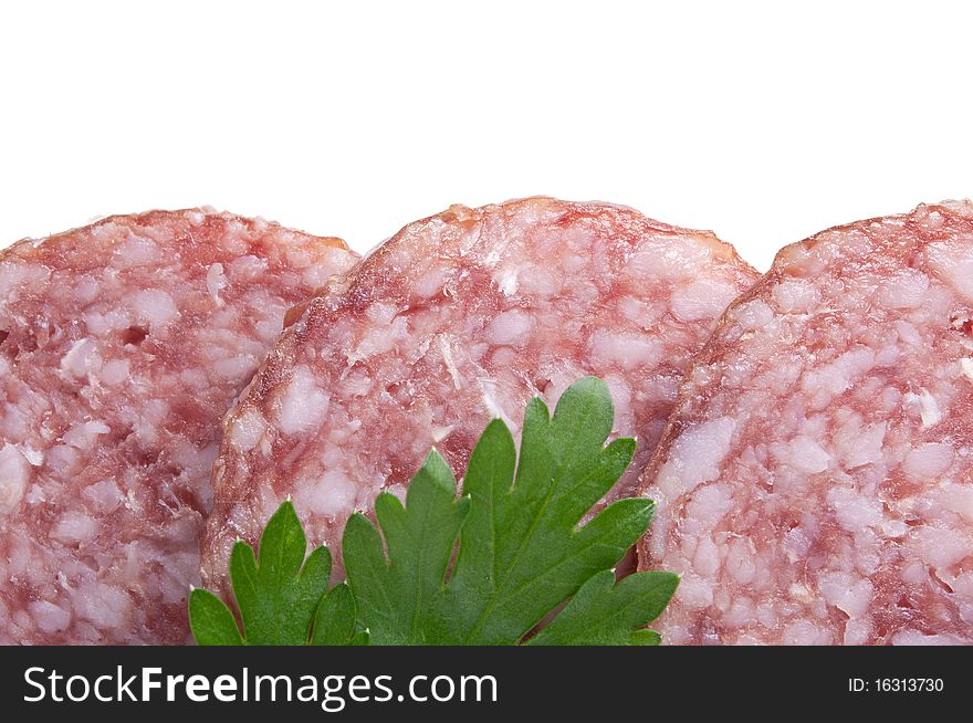 Close up of sliced salami with parsley, isolated on white. Close up of sliced salami with parsley, isolated on white