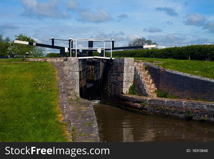 Looking towards a lock on the Trent and Mersey canal. Looking towards a lock on the Trent and Mersey canal