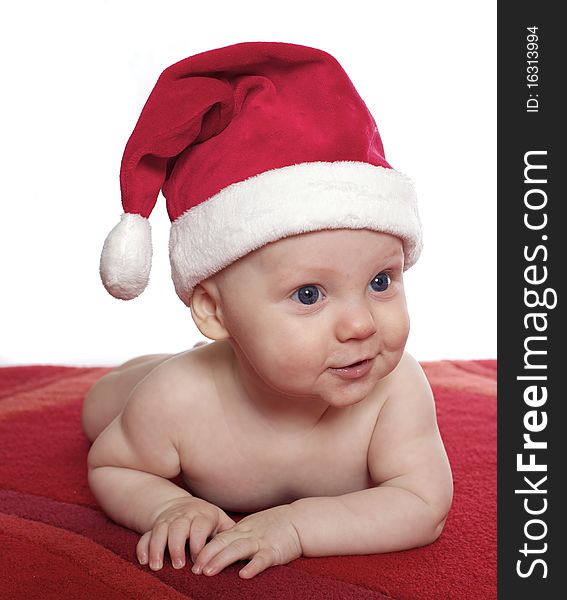 Close up of cute baby boy in santa hat