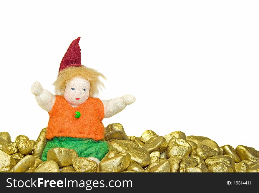 Doll sitting on gold nuggets. Doll sitting on gold nuggets