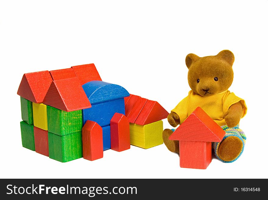 Teddy bear is dreaming of a own house. Teddy bear is dreaming of a own house