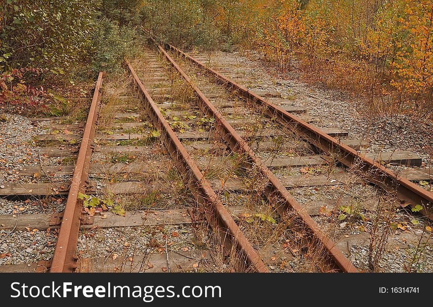 Railroad tracks at an abandoned factory. Railroad tracks at an abandoned factory