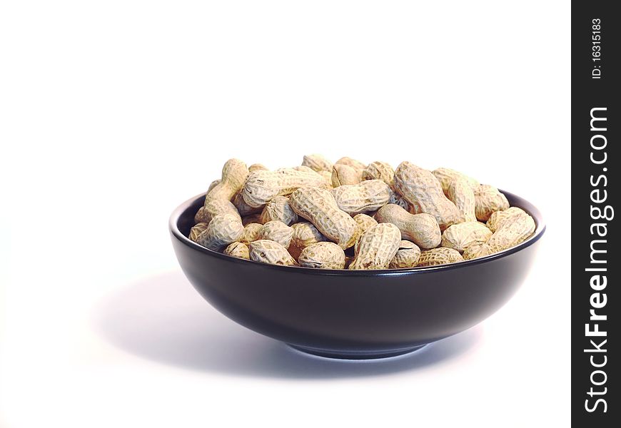 Black Bowl With Unshelled Peanuts
