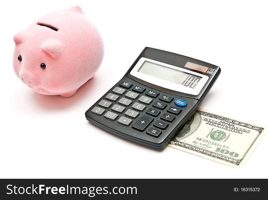 Calculator, piggy bank and 100 dollars. Isolated on white background. Calculator, piggy bank and 100 dollars. Isolated on white background