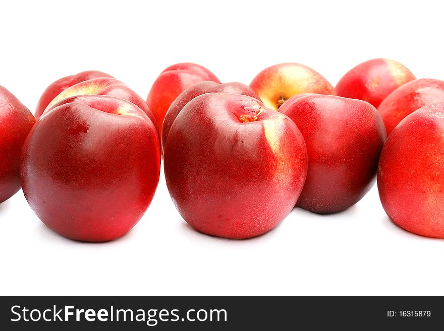 Many nectarines isolated on the white background. Many nectarines isolated on the white background