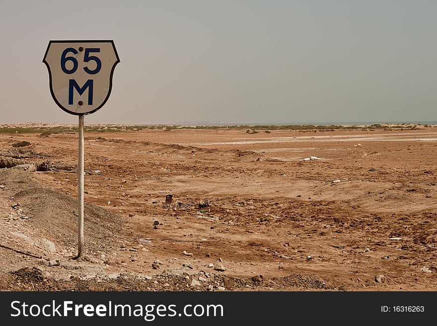 A road sign in the desert of Egypt. A road sign in the desert of Egypt