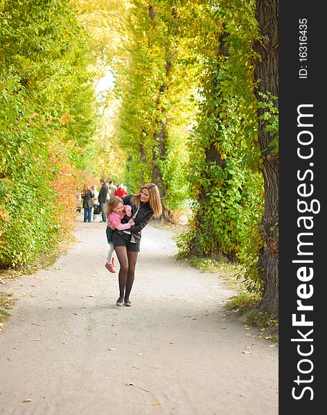 Family in autumn park