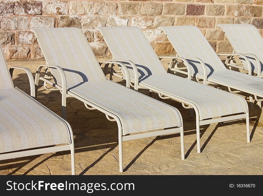 A number of plank beds at hotel close up