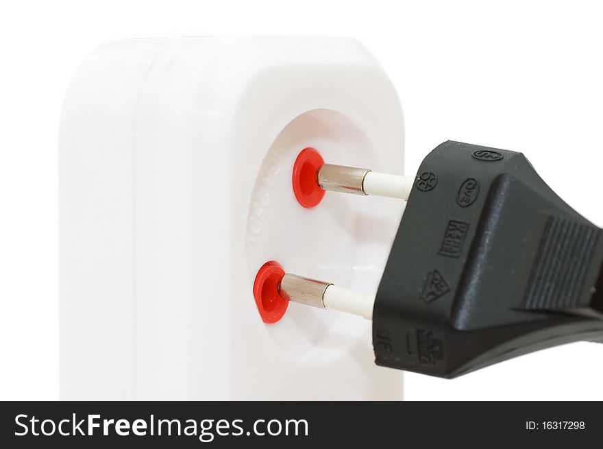Extension cord with plugs isolated over white