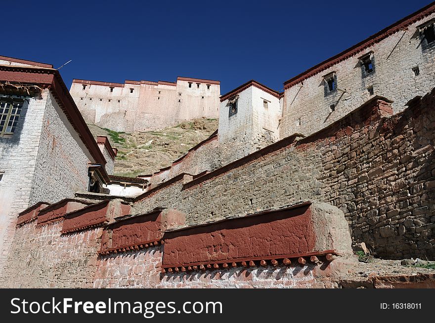 Scenery of historical Tibetan buildings with blue skies as backgrounds in Tibet