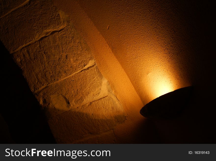 Lamp on a textured wall-diffused lighting