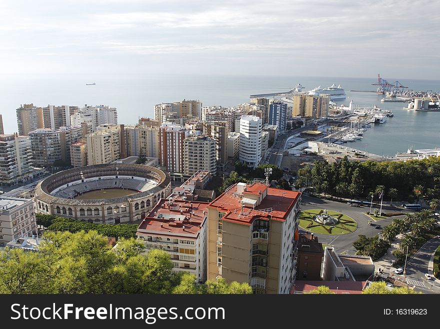Málaga and its port as seen from Gibralfaro mountain. Málaga is a city and a municipality in the Autonomous Community of Andalusia, Spain. Málaga and its port as seen from Gibralfaro mountain. Málaga is a city and a municipality in the Autonomous Community of Andalusia, Spain.