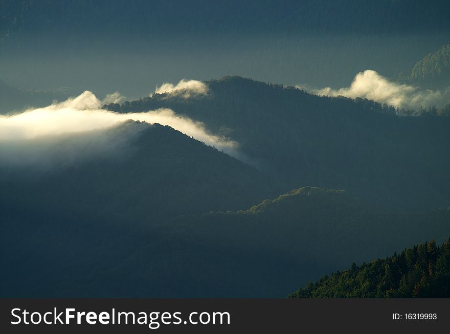 Fog and clouds in the early morning, sunrise in the national park kalkalpen in upper austria. Fog and clouds in the early morning, sunrise in the national park kalkalpen in upper austria