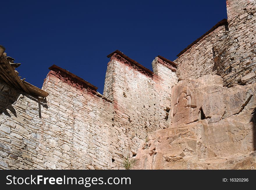 Scenery of historical Tibetan walls with blue skies as backgrounds in Tibet. Scenery of historical Tibetan walls with blue skies as backgrounds in Tibet