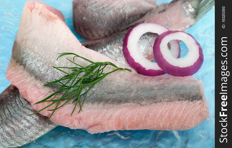 Portion of typical Dutch herring on the plate