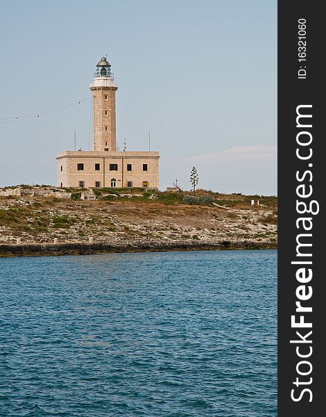Lighthouse in vieste, gargano, apulia, italy in the evening