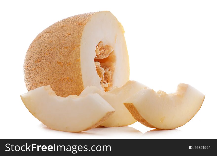 Pieces of juicy melon isolated over white