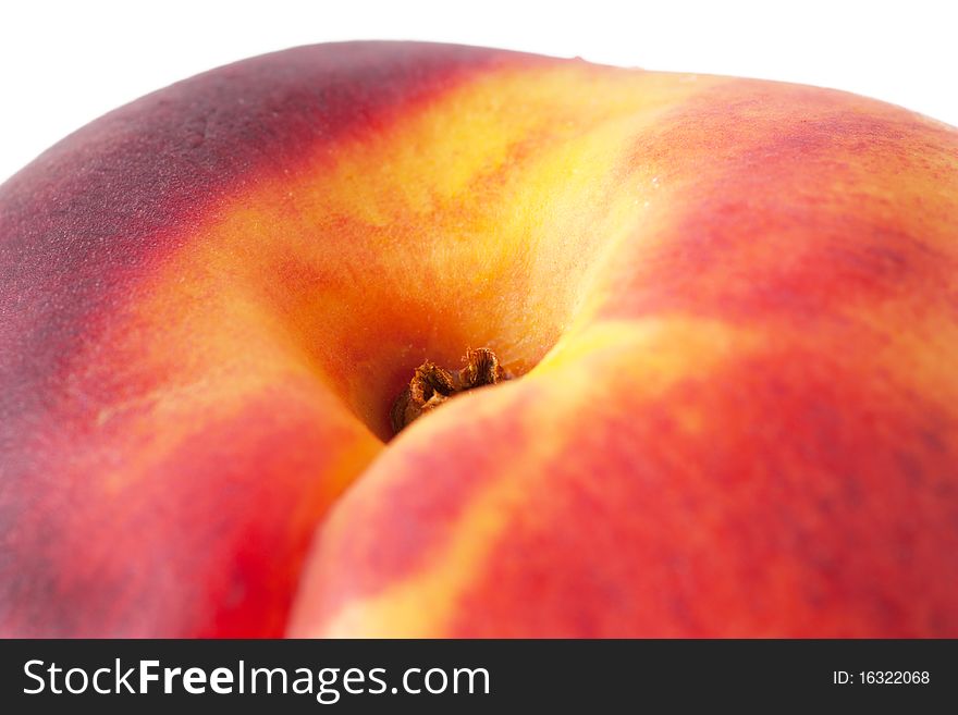 Macro view of tasty juicy peach on a white background. Macro view of tasty juicy peach on a white background