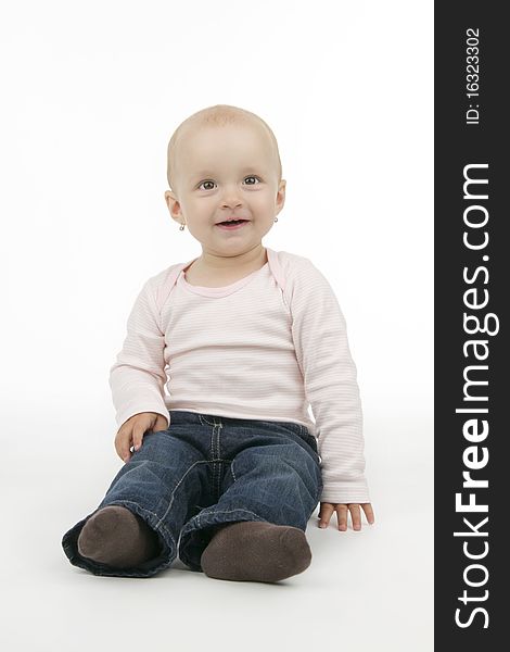 Infant sit, on white background.