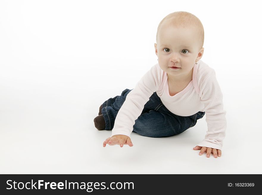 Dinky little girl sit, on white background.