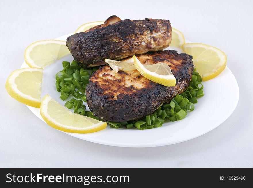 Roast salmon on white background