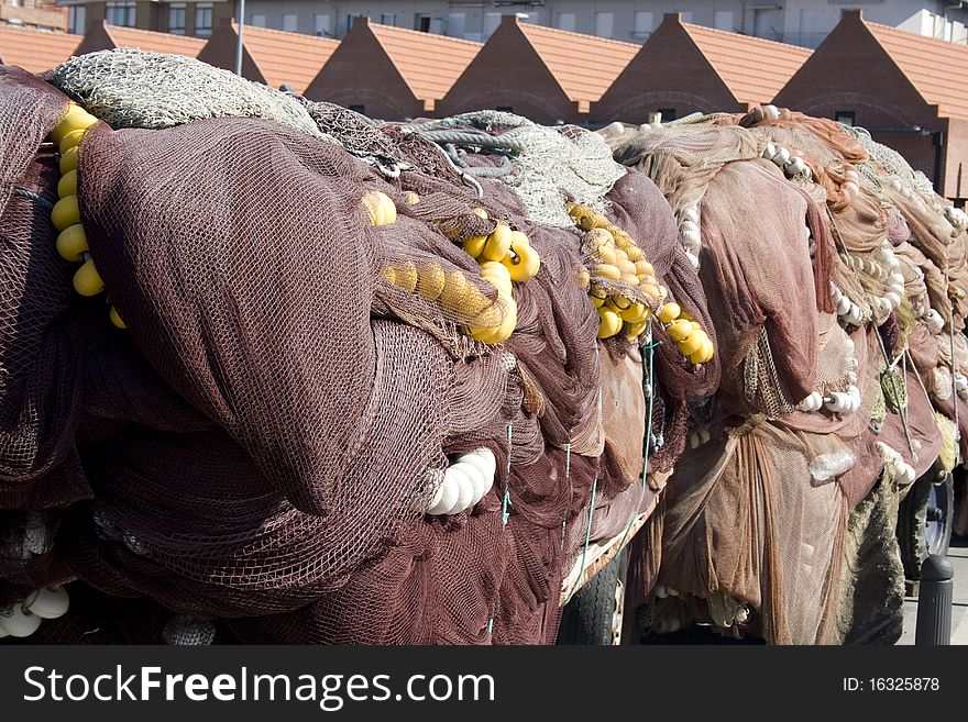 Fishing nets stacked outside the sea