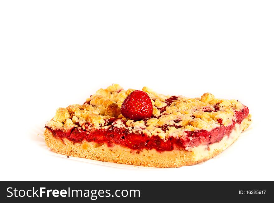 Piece of freshly baked strawberry cake decorated with a fruit. Piece of freshly baked strawberry cake decorated with a fruit