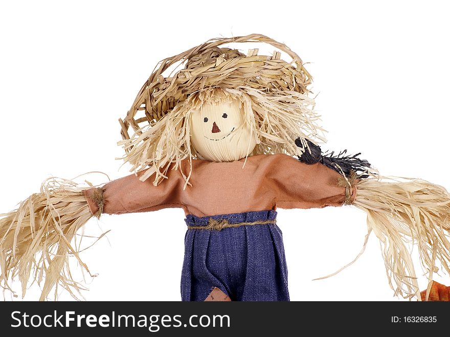 A Halloween Scarecrow Decoration in a Straw Hat. A Halloween Scarecrow Decoration in a Straw Hat