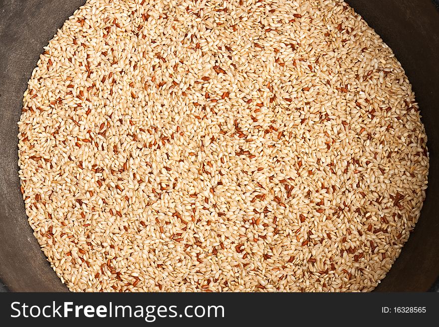 Brown milled unpolished rice background