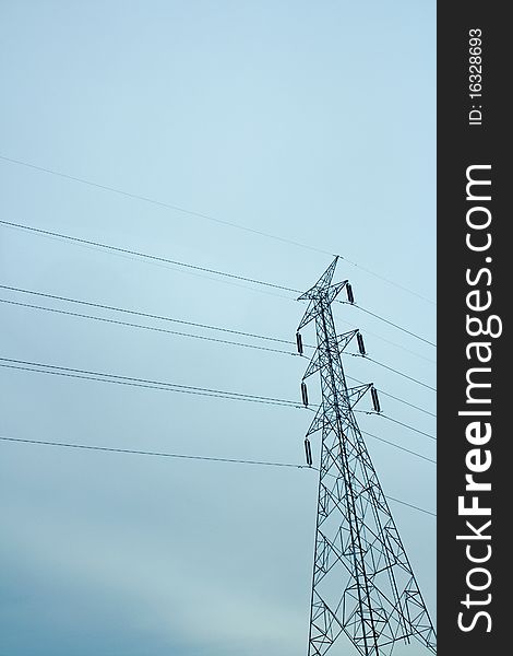 Electrical tower against blue sky. Electrical tower against blue sky