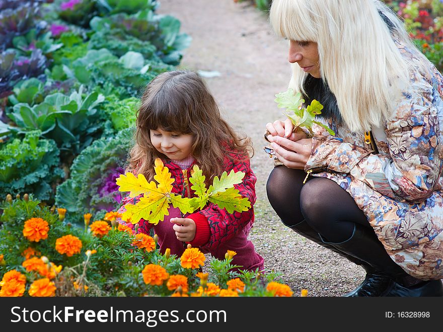 Mother and daughter playing in a park