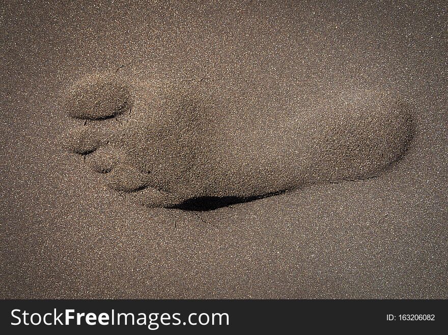 foot print in the sandon beach