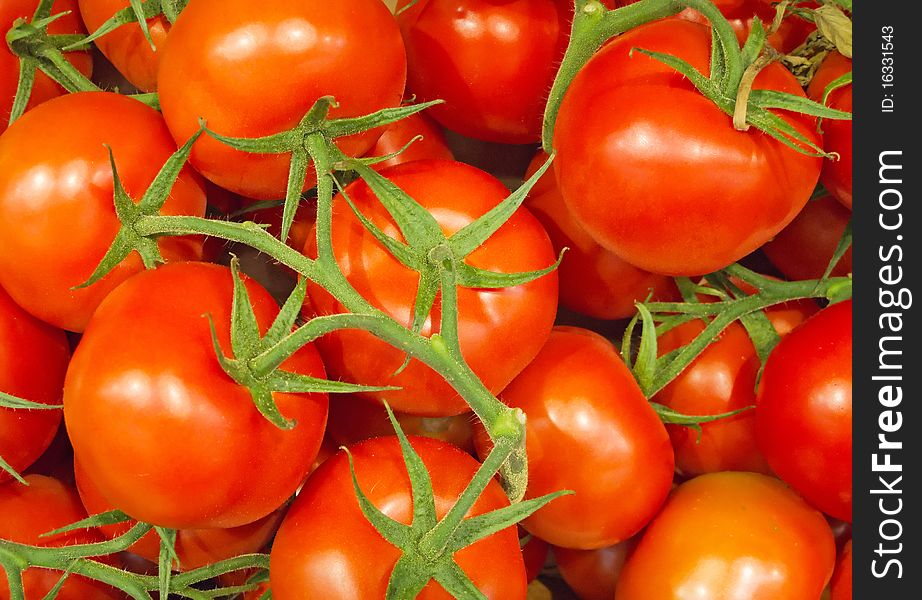 A lot of red ripe tomatoes background