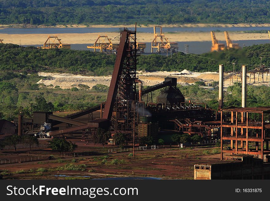 This is a midrex direct reduction plant, it utilizes natural gas to reduce iron ore to produce Direct Reduced Iron.