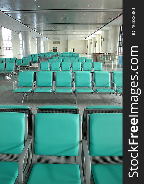 Group of seats in waiting room. Train station hall in Guangzhou, China.