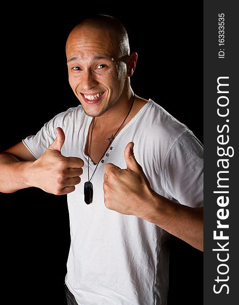 Young male filipino model over a black background is gesturing with his hand. Young male filipino model over a black background is gesturing with his hand.