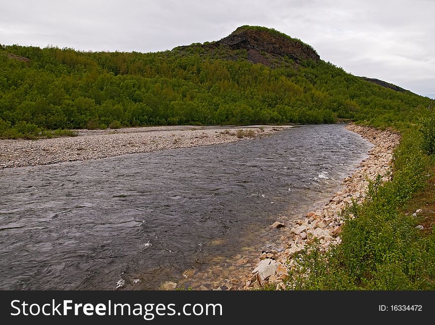 River of Finnmark Norway june cloudy day. River of Finnmark Norway june cloudy day