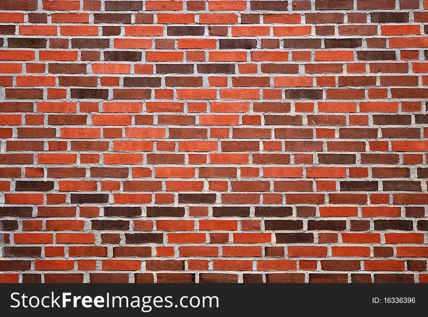 Brick wall is made of various material. It has shades of red and brown. Brick wall is made of various material. It has shades of red and brown.