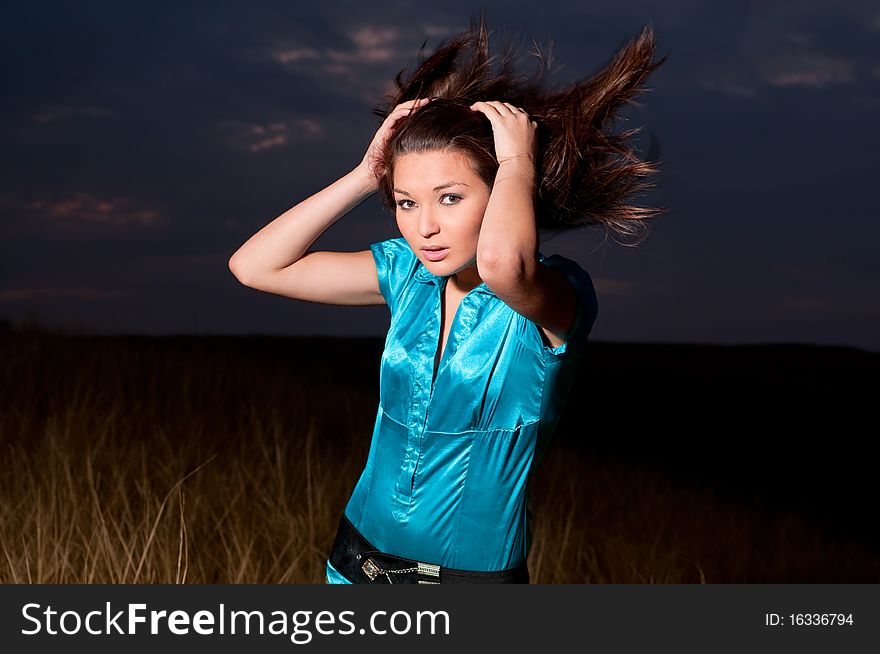 Portrait of young woman with long hair