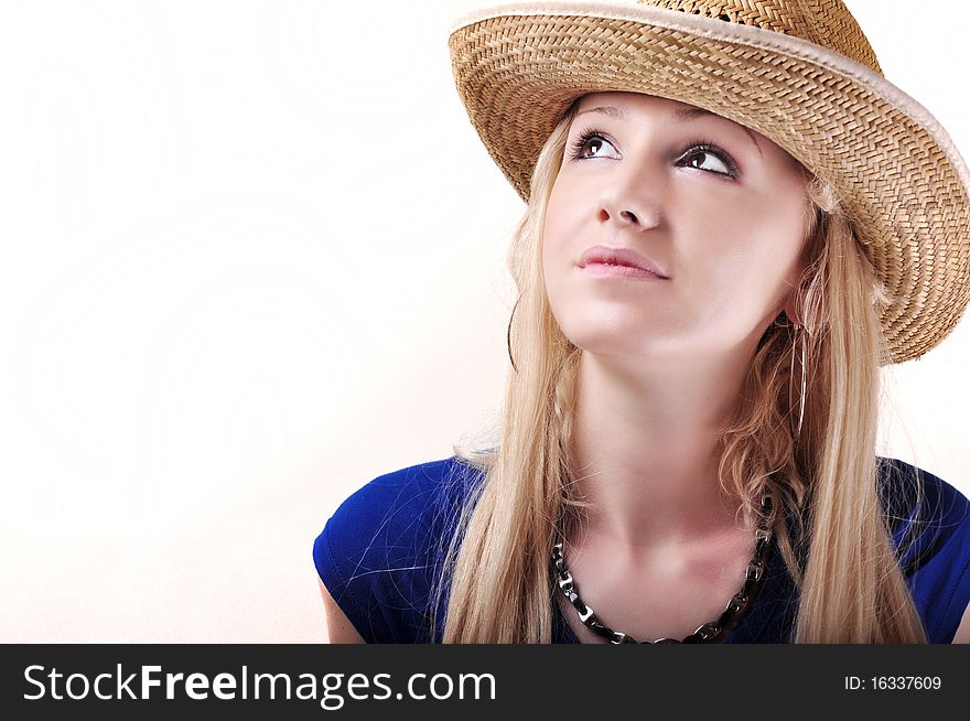 Pretty cowboy girl isolated on the white background