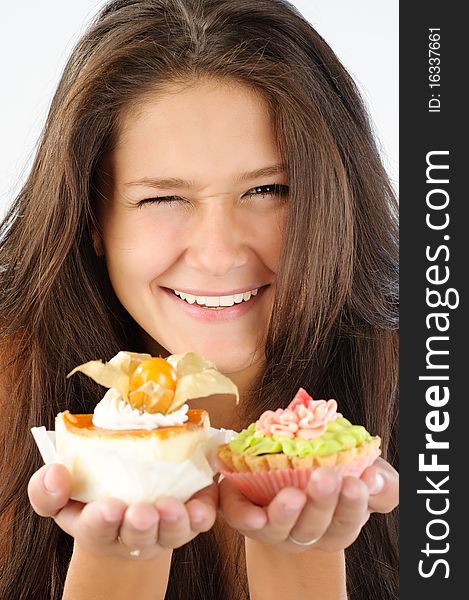 Young woman glad to offer you a delicious cakes. Young woman glad to offer you a delicious cakes