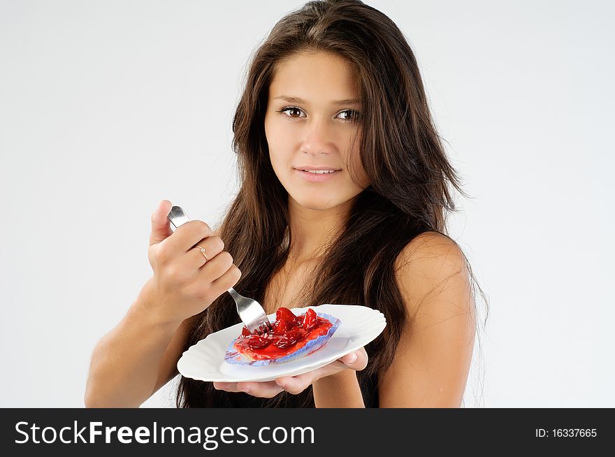 Cute young girl wanted tasty cake badly. Cute young girl wanted tasty cake badly