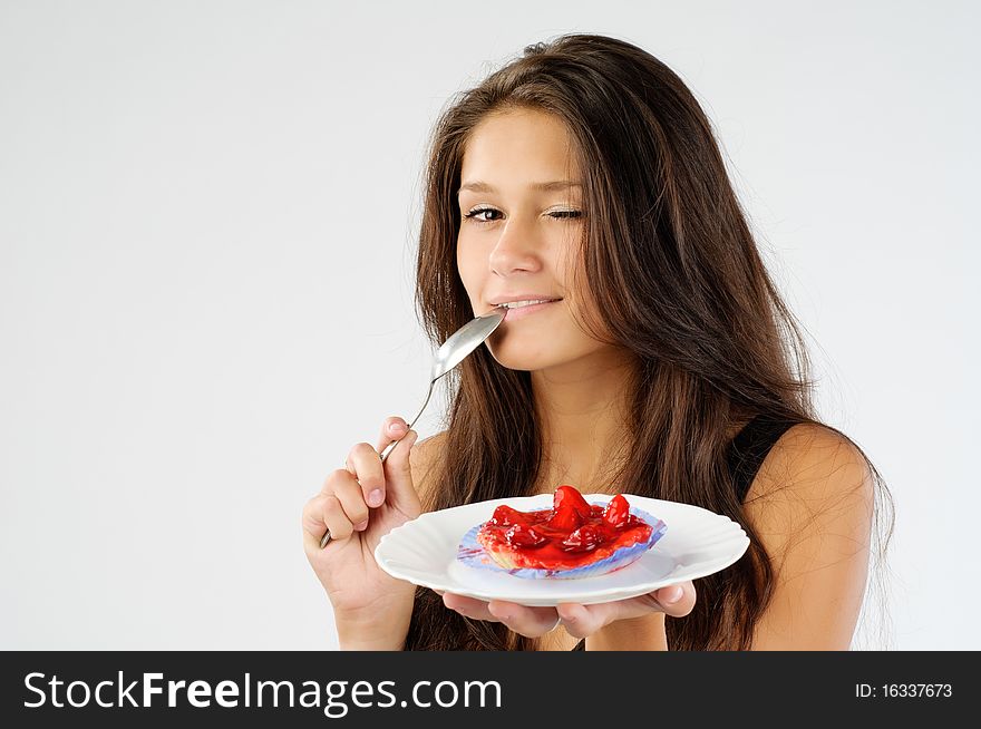 Cute young girl wanted tasty cake badly. Cute young girl wanted tasty cake badly