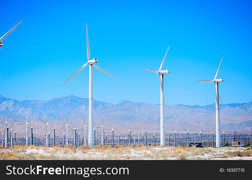 windmills in the blue sky. windmills in the blue sky