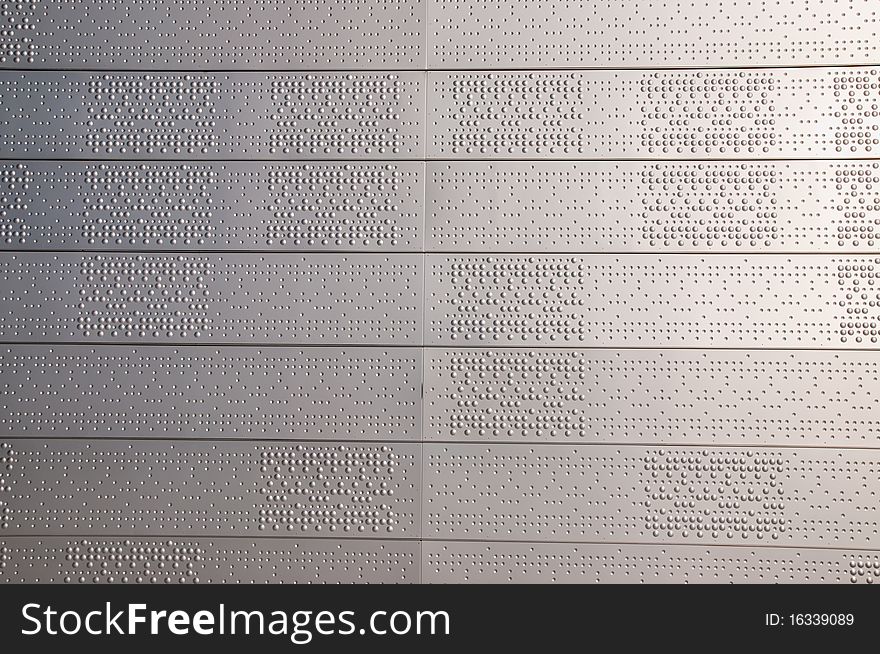 Corrugated aluminum sheets on the wall as background