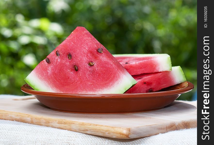 Fresh watermelon slices on a white background